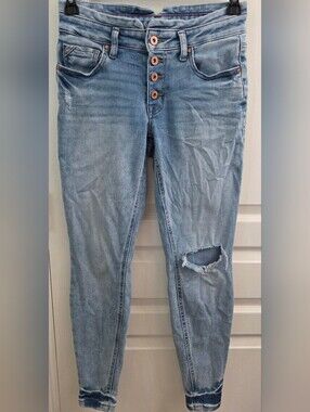 Women's Light Blue Distressed Skinny Jeans with Button-Fly